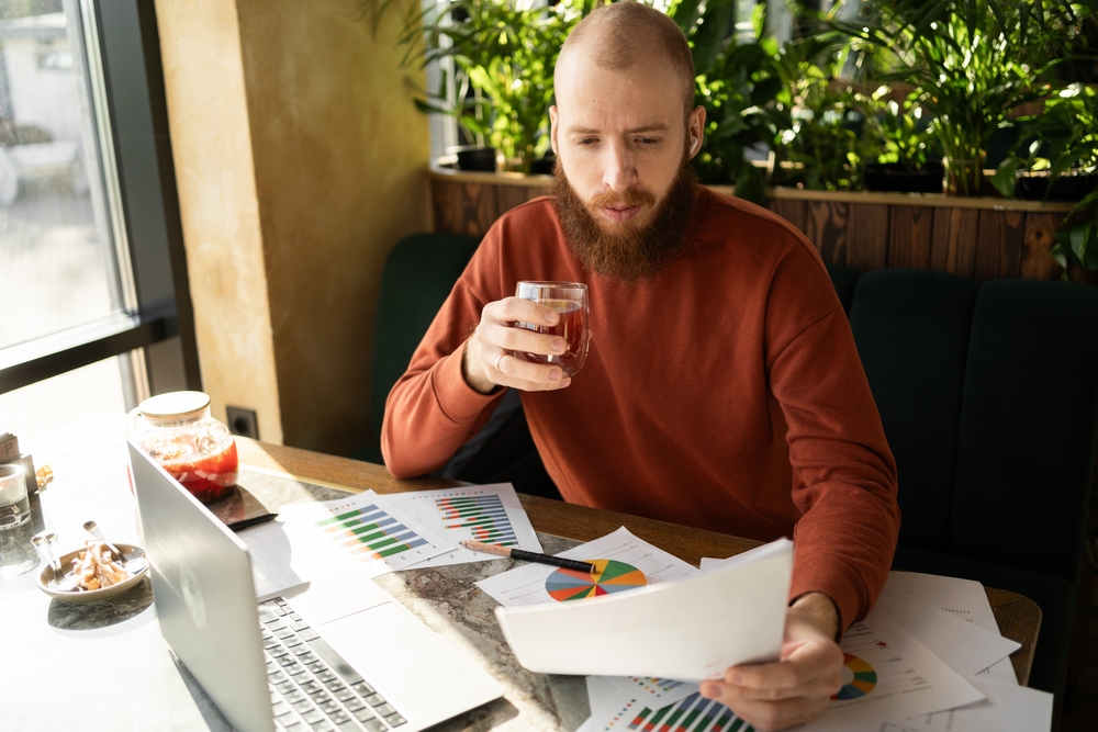 Person using phone to manage mail